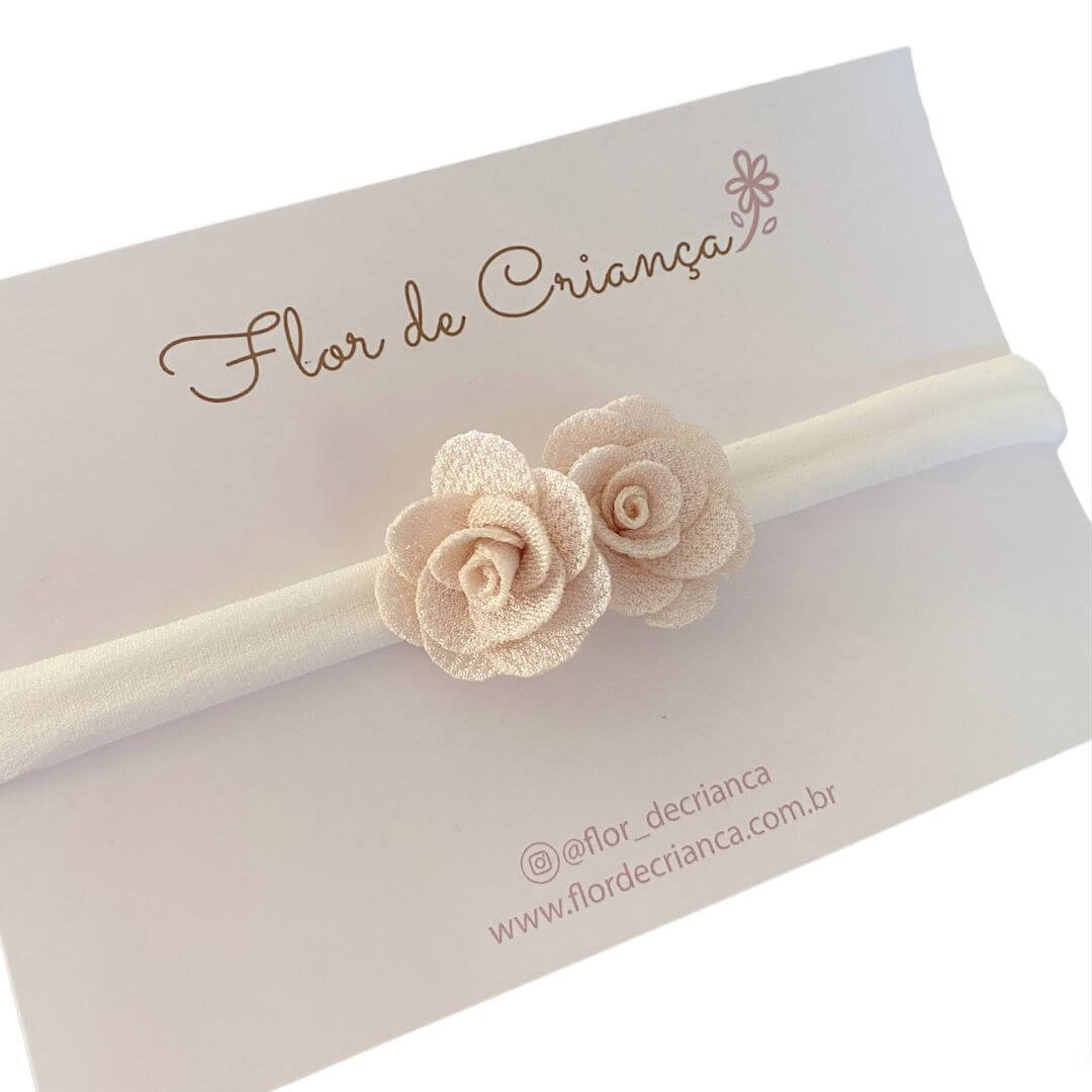 faixa de bebe com flor